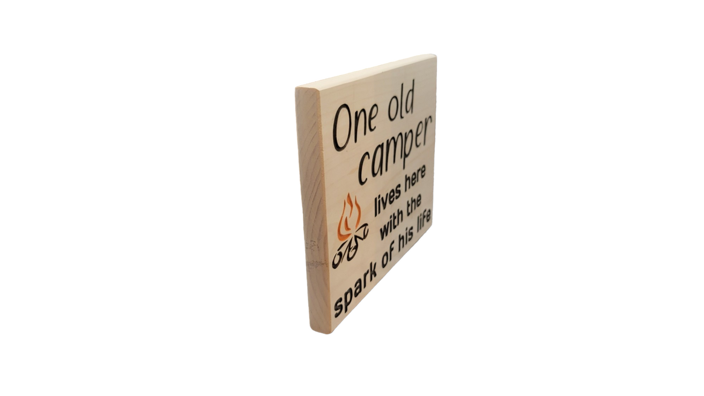 One Old Camper Lives Here with the Spark of His Life Sign